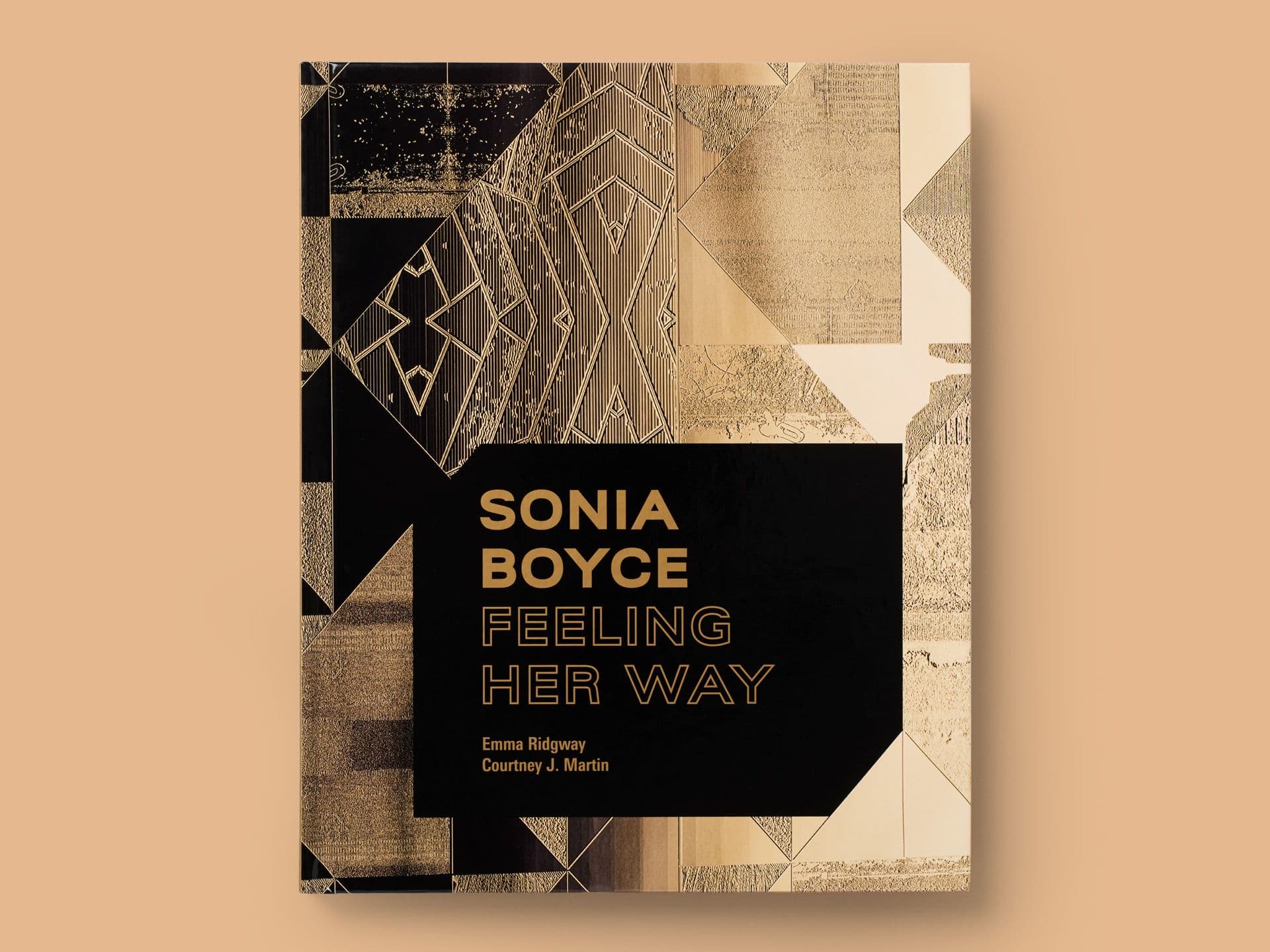 Book titled "Sonia Boyce: Feeling Her Way" on a warm beige background, featuring an abstract geometric cover design in black and gold foil textures. Central black panel displays the title in gold typography, with authors Emma Ridgway and Courtney J. Martin credited below.