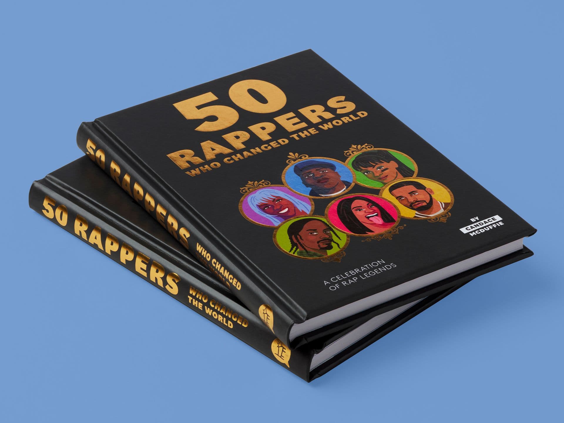 Stack of two black books titled 50 Rappers Who Changed the World by Candace McDuffie, featuring illustrated portraits of rappers on the cover against a blue background.