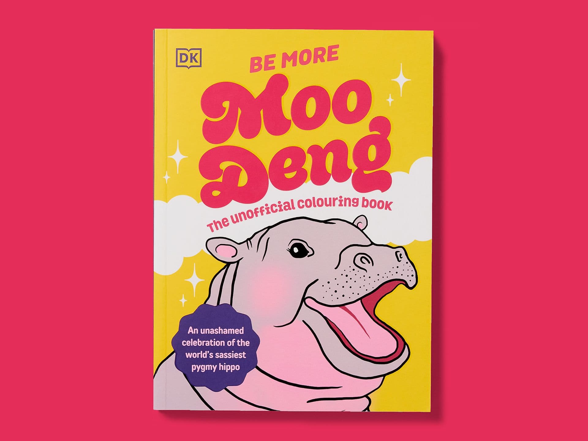 Yellow book cover titled "Be More Moo Deng: The unofficial colouring book", featuring a large illustrated pygmy hippo with an open mouth, playful pink typography, sparkles and clouds, a DK logo at the top, and a badge reading "An unashamed celebration of the world’s sassiest pygmy hippo," set against a pink background.