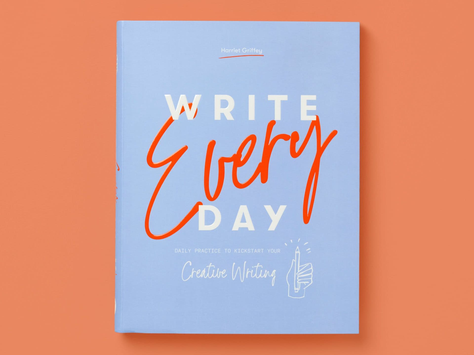 Light blue book cover titled "Write Every Day" by Harriet Griffey, featuring bold white and orange hand-lettered typography, the subtitle "Daily practice to kickstart your creative writing," and a small illustrated pen icon, set against a peach background.