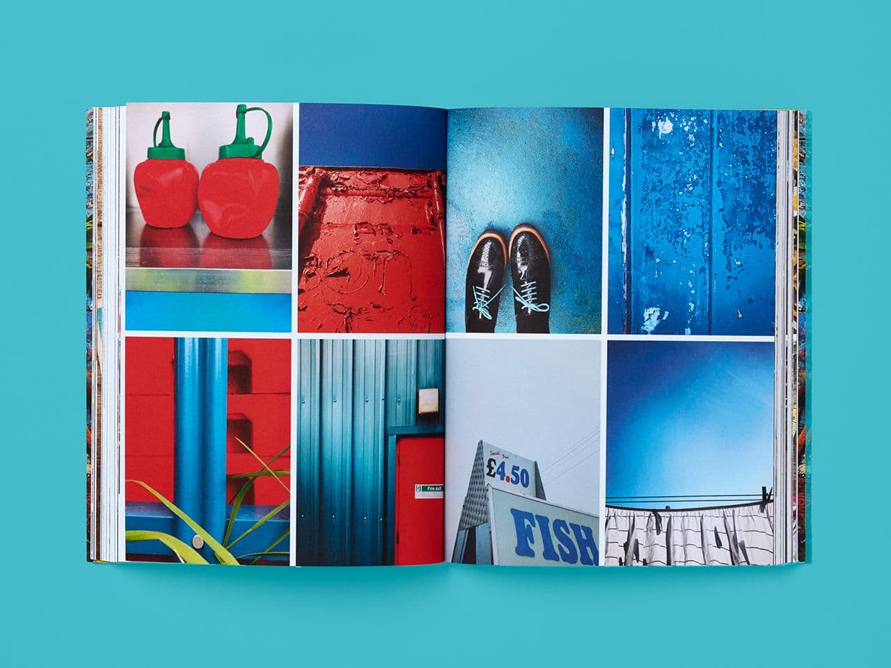 Open book spread from Conscious Creativity featuring a grid of photographic studies in red and blue tones. Images include paired red bottles, thick red paint texture, shoes viewed from above on a blue floor, weathered blue surfaces, red and blue architectural details, a plant against painted walls, corrugated metal, and a seaside sign and sky, exploring colour, texture, and everyday forms.