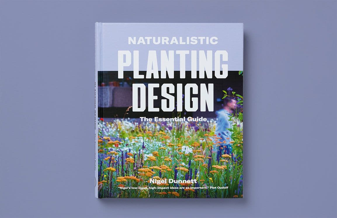 Book cover titled "Naturalistic Planting Design: The Essential Guide" by Nigel Dunnett, featuring a photograph of a meadow-style planting scheme with wildflowers and grasses, bold white typography, and the author’s name at the bottom, set against a muted grey background.